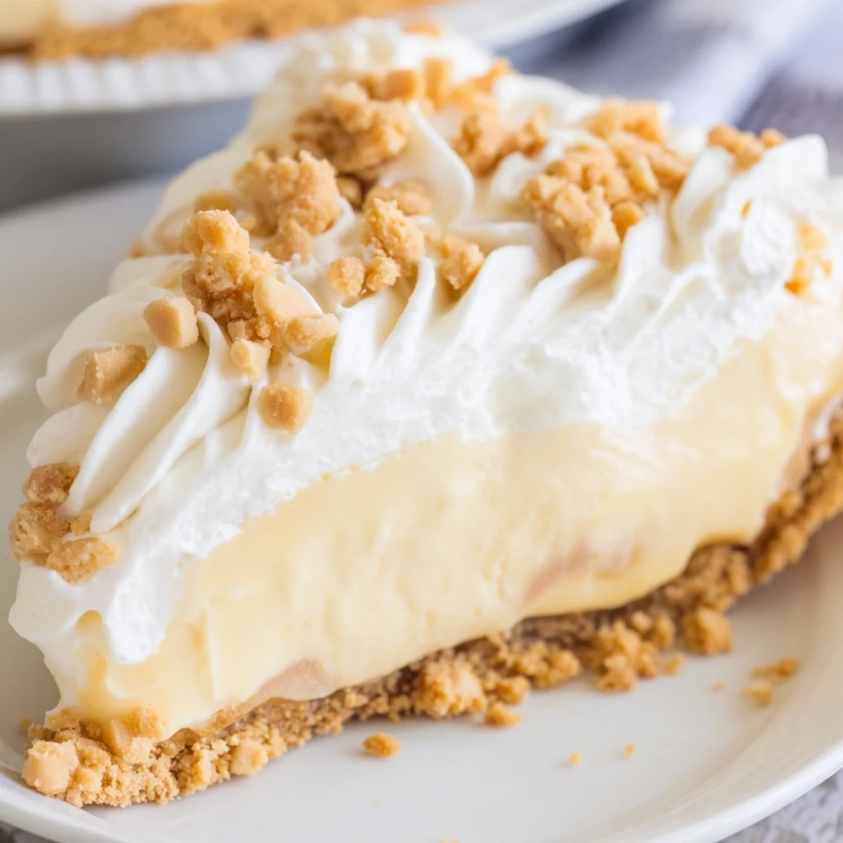 Velvety Amish Peanut Butter Dream Pie sliced thick showing rich custard filling inside