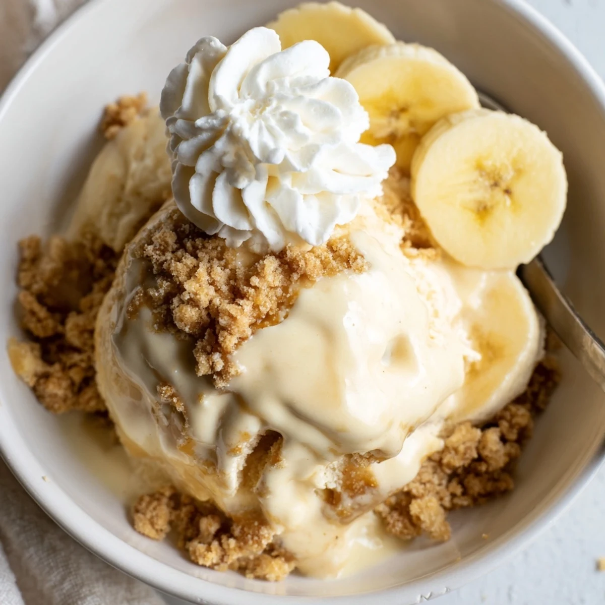 Ninja Creami Banana Cream Pie Ice Cream, silky pale yellow with graham swirl