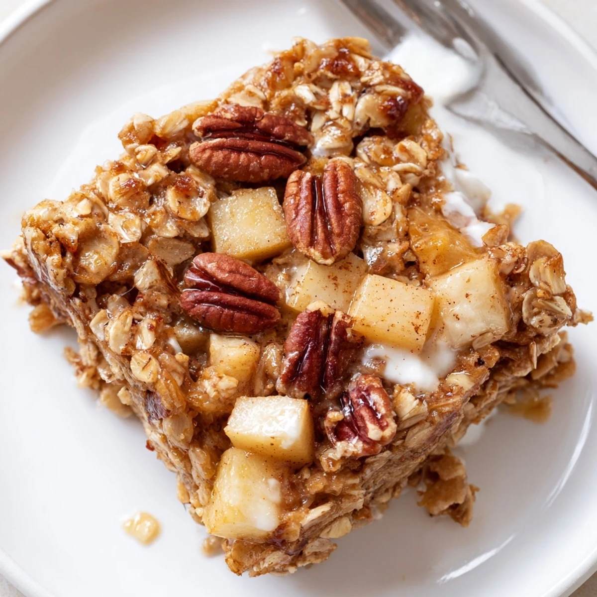 Delicious Apple Cinnamon Oatmeal Bake Recipe For Mornings, golden crust steaming, maple sweet aroma