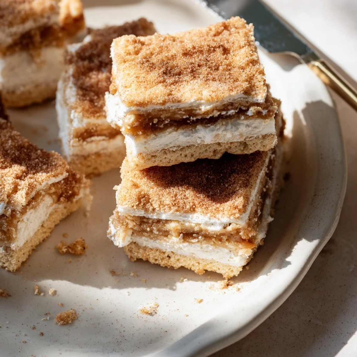 Churro Saltine White Toffee squares with golden bubbly toffee and cinnamon topping