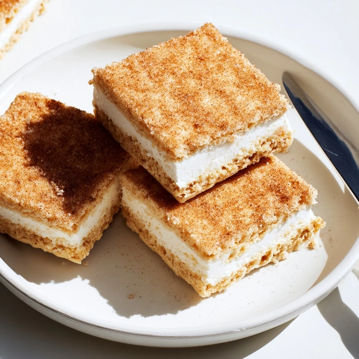 Warm Churro Saltine White Toffee cooling on a foil-lined baking sheet